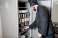 Chef cook getting food from the refrigerator Royalty Free Stock Photo