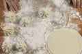 Chef cook making khinkali on wooden table. Process preparation georgian meal.