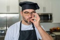 Chef cooker, baker. Male chefs with sign of perfect food. Chef man cooking, showing sign for delicious. Chef, cook Royalty Free Stock Photo