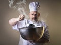 Chef cooking on a casserole Royalty Free Stock Photo