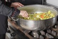 Chef cooking at commercial kitchen Royalty Free Stock Photo