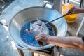 Chef cooking deep-fried fish in the big pan to Chinese banquet food preparation. fat from trans-fat concept. disease from choleste