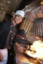 Chef cooking at dinner Royalty Free Stock Photo