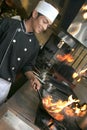 Chef cooking at dinner Royalty Free Stock Photo