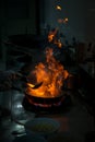 Chef cooking and doing flambe on food Royalty Free Stock Photo