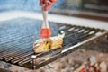 Chef cooking dorado fish on grill. Royalty Free Stock Photo