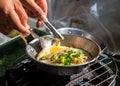 Chef cooking egg frying pan. Royalty Free Stock Photo