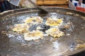 Chef cooking food fry Pan-fried crispy mussel at Street food at Yoawaraj Road Royalty Free Stock Photo