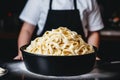 A chef cooking homemade pasta close up