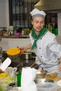 Chef cooking at kitchen Royalty Free Stock Photo