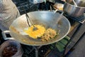 Chef cooking Pad Thai stir-fried rice noodles with shrimp Royalty Free Stock Photo