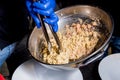 Chef cooking pasta with mussels in pan. Italian style cuisine. Restaurant. Royalty Free Stock Photo