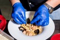 Chef cooking pasta with mussels in pan. Italian style cuisine. Restaurant. Royalty Free Stock Photo