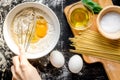 Chef cooking pasta top view on dark background Royalty Free Stock Photo