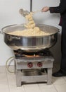 Chef cooking rice at a commercial kitchen Royalty Free Stock Photo