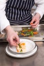 Chef cooking seafood lasagna Royalty Free Stock Photo