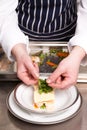 Chef cooking seafood lasagna Royalty Free Stock Photo