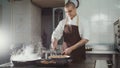 Chef cooking spaghetti in restaurant Royalty Free Stock Photo