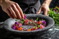 Chef crafting a vegan haute cuisine dish with fresh ingredients