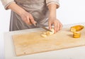 Chef cuts a banana Royalty Free Stock Photo