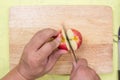 Chef cutting apple Royalty Free Stock Photo