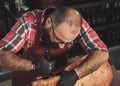 Chef cutting beef carcass in a restaurant Royalty Free Stock Photo