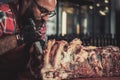 Chef cutting beef carcass in a restaurant Royalty Free Stock Photo