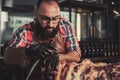 Chef cutting beef carcass in a restaurant Royalty Free Stock Photo