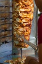 Chef cutting with doner knife Traditional Turkish Doner Kebab meat Royalty Free Stock Photo