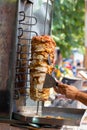 Chef cutting with doner knife Traditional Turkish Doner Kebab meat