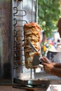 Chef cutting with doner knife Traditional Turkish Doner Kebab meat