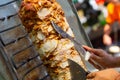 Chef cutting with doner knife Traditional Turkish Doner Kebab meat Royalty Free Stock Photo