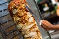 Chef cutting with doner knife Traditional Turkish Doner Kebab meat Royalty Free Stock Photo