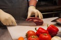 Chef cutting meat Royalty Free Stock Photo