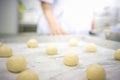 The chef are cutting and molding dough. Royalty Free Stock Photo