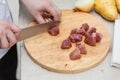 Chef Cutting Raw Meat on The Wood Block Royalty Free Stock Photo