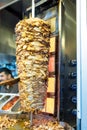 Chef cutting traditional Turkish food Shawarma chicken