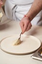 Chef dicing duck fillet. Chef cutting poultry meat