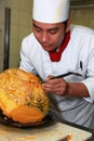 Chef doing carving Royalty Free Stock Photo