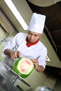 Chef doing carving Royalty Free Stock Photo