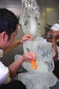 Chef doing ice carving Royalty Free Stock Photo