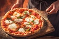 Chef duo presents Offering delectable pizza in a hotel or restaurant Royalty Free Stock Photo