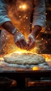 Chef dusting flour on dough in dramatic lighting Royalty Free Stock Photo