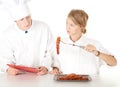 Chef examining cook Royalty Free Stock Photo