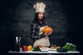 Chef female holds punmping. Royalty Free Stock Photo