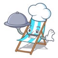 Chef with food beach chair mascot cartoon Royalty Free Stock Photo