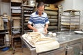 Chef forming dough in order to prepare bread