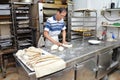 Chef forming dough in order to prepare bread