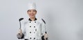 Portrait beautiful asian woman cook wearing chef uniform making gesture