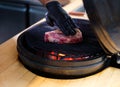 Chef grilling steak in a restaurant Royalty Free Stock Photo